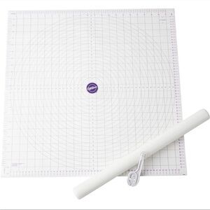 Brand new 3Pc. Wilton Cutter and Mat Fondant Tool Set